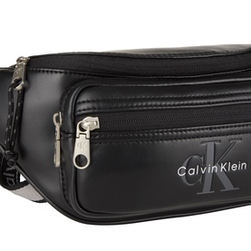 Calvin Klein Bold Logo Belt Bag in black faux leather, silver-tone hardware, two exterior zip pockets and embossed CK logo detail