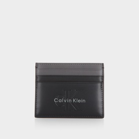 Calvin Klein black nappa leather cardholder with tonal debossed logo and grey contrast top panel