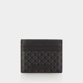 Calvin Klein black cardholder with allover CK monogram print, flat card slot design in coated fabric finish
