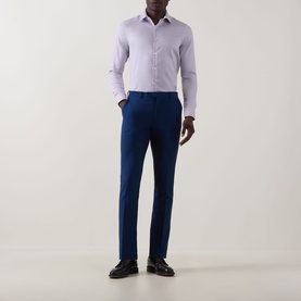 Model wearing Calvin Klein Stretch Single-Cuff Shirt in burgundy, slim fit with classic collar, styled with navy tailored trousers and black loafers
