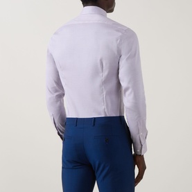 Model wearing Calvin Klein Stretch Single-Cuff Shirt in burgundy, back view, classic collar, long sleeves, styled with blue trousers