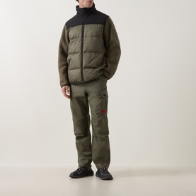 Model wearing Boss Green Label Open Green puffer jacket with black yoke, styled with matching cargo trousers and dark trainers.