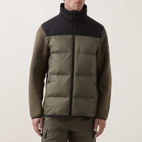 Model wearing Boss Green Label Open Green quilted puffer jacket with black neoprene upper panel and zip fastening