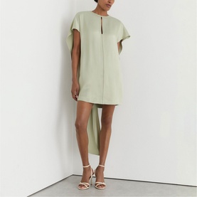 Model wearing Reiss grey short-sleeve mini dress with keyhole neckline and hi-lo hem, styled with white strappy heeled sandals