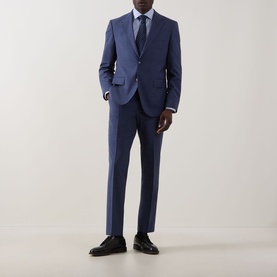 Model wearing Eton Bengal Stripe Single-Cuff Shirt in teal, styled with a navy blue suit and black dress shoes.