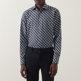 Model wearing Eton Geometric Print Single-Cuff Shirt in navy blue with all-over geometric pattern, cut-away collar and long sleeves, styled with navy