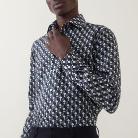 Model wearing Eton Geometric Print Single-Cuff Shirt in navy blue with all-over geometric print, cut-away collar, and long sleeves
