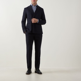 Model wearing Eton Dark Blue Single Cuff Slim shirt, styled with a navy suit and black leather dress shoes.