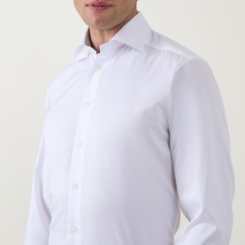 Model wearing Eton Twill Single Cuff Shirt in white, showing pointed collar, button placket and slim fit silhouette.