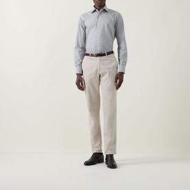 Model wearing Eton Micro Print Single-Cuff Shirt in navy blue with stone chinos, brown leather belt, and black shoes.