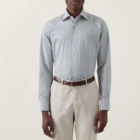 Model wearing Eton Micro Print Single-Cuff Shirt in navy blue, slim fit with spread collar and long sleeves, styled with beige trousers and brown