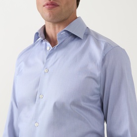 Model wearing Eton Dark Blue Single Cuff Slim formal shirt, 100% cotton, close-up of collar and chest detail