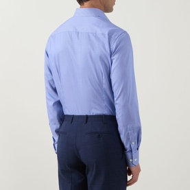 Model wearing Eton Mid Blue Single Cuff Regular formal shirt, rear view, styled with navy trousers