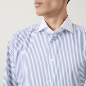 Model wearing Eton light blue stripe cotton formal shirt with white contrast collar, single cuff regular fit, close-up detail shot