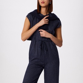 Model wearing WHISTLES Grid Check Drawstring Jumpsuit &ndash; upper body view showing neckline and cap sleeve detail