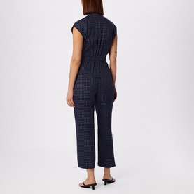 Model wearing WHISTLES Grid Check Drawstring Jumpsuit &ndash; full length from the back view styled with sandals