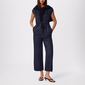 Model wearing WHISTLES Grid Check Drawstring Jumpsuit &ndash; full length view styled with sandals