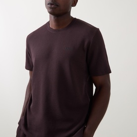 Model wearing Hugo Boss dark brown cotton-blend pyjama top with subtle logo embroidery at chest and short sleeves
