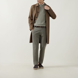 Model wearing John Smedley 15.Singular Knit Sweater in Thistle Drew, styled with brown overcoat and olive trousers