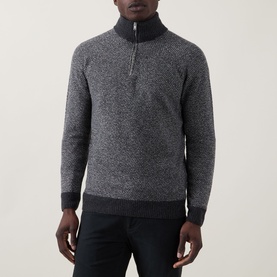 Model wearing John Smedley Inghram Textured Half-Zip Sweater in charcoal, featuring ribbed funnel neck, half-zip placket and textured knit