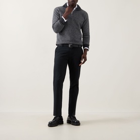 Model wearing John Smedley Inghram Textured Half-Zip Sweater in charcoal, styled with black trousers and loafers