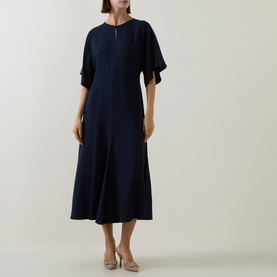 Model wearing Hugo Boss dark blue midi dress with flutter sleeves, keyhole neckline and flared skirt, styled with nude heels