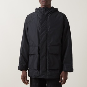 Model wearing Hugo black casual jacket with hood, chest flap pockets, and zip-through front fastening