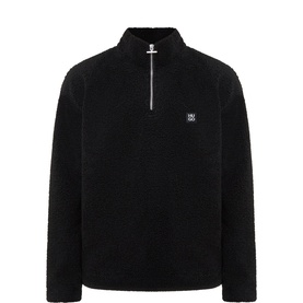 Hugo black quarter-zip fleece with teddy texture and small logo badge at chest