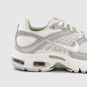 Nike trainer in Sail Pale Ivory Phantom, chunky mesh upper with silver Swoosh, Air Max cushioned sole, close-up detail shot