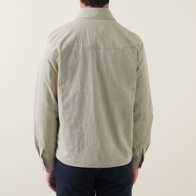 Model wearing Paul Smith Technical Harrington Jacket in brown, rear view, showing pointed collar, long sleeves and chest pocket detail