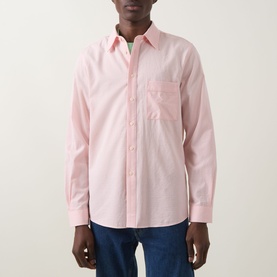 Model wearing Paul Smith pink casual shirt with chest pocket, styled with navy trousers