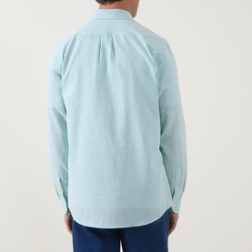 Model wearing Paul Smith Textured Stripe Shirt in green, rear view showing box pleat, classic collar, and long sleeves with single cuffs.