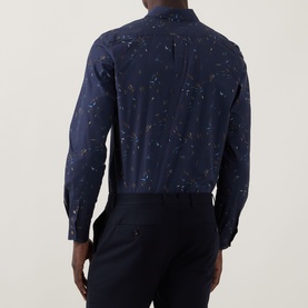 Model wearing Paul Smith Casual Abstract Print Shirt in navy, back view, with dark trousers. Long sleeves, buttoned cuffs, abstract print detail.