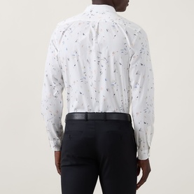 Model wearing Paul Smith Casual Abstract Print Shirt in white with scattered abstract print, styled with black trousers. Rear view.