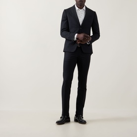 Model wearing Paul Smith Casual Abstract Print Shirt in white, styled with a black tailored suit and black leather shoes.