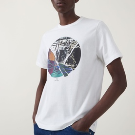 Model wearing Paul Smith Graphic Logo T-Shirt in white with circular multicolour graphic print, styled with blue jeans.