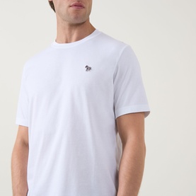 Model wearing Paul Smith white crew neck T-shirt with embroidered zebra logo on chest.