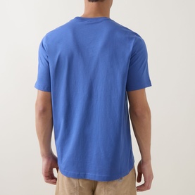 Model wearing Paul Smith Zebra Badge T-Shirt in blue, back view, crew neck, short sleeves, straight hem, 100% cotton.