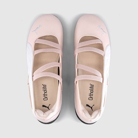 Puma ballet flats in Jasmine Flower, pale pink with crossover straps, OrthoLite insole, black outsole, overhead view