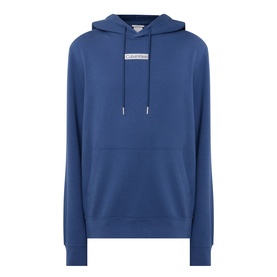 Calvin Klein hoodie in Dark Denim blue with drawstring hood and small logo patch on chest, ribbed cuffs and hem