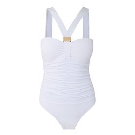 White ruched bandeau swimsuit with cross-back straps and gold hardware detail at centre front