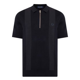 Fred Perry Panel Detail Knitted Polo Shirt in black with tonal waffle-stitch panels, gold half-zip placket, short sleeves, and ribbed trims