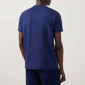 Model wearing Fred Perry Ringer Laurel Wreath T-Shirt in French Navy, rear view, crew neck, short sleeves, smooth cotton finish