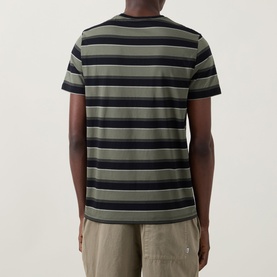 Model wearing Fred Perry black striped crew neck cotton T-shirt, back view, styled with khaki trousers.