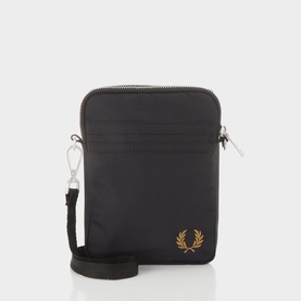Fred Perry Brentham Small Crossbody Bag in black with silver-tone hardware, adjustable strap, zip fastening and embroidered Laurel Wreath logo