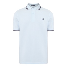 Fred Perry Twin Tipped polo shirt in light blue with navy tipping on collar and cuffs, logo embroidered at chest