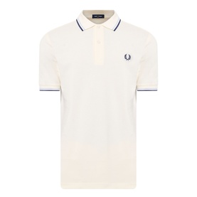 Fred Perry Twin Tipped Polo Shirt in cream with navy tipped collar and cuffs, embroidered laurel wreath logo