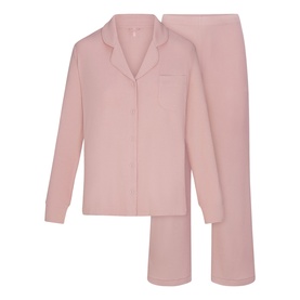 Skims Pyjamas in Morganite pink, long-sleeve button-up top with collar and matching straight-leg trousers