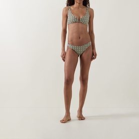 Model wearing Away That Day Bikini Brief in navy/gold link print, paired with matching underwired bikini top