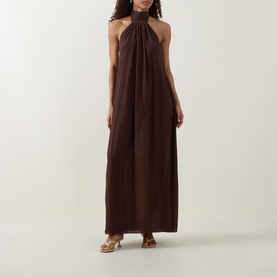 Model wearing Away That Day Espresso Crinkle Linen halterneck maxi dress, styled with gold strappy sandals